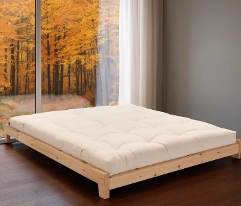 Herfst in de slaapkamer - hoe warm je het interieur op met futons en accessoires?
